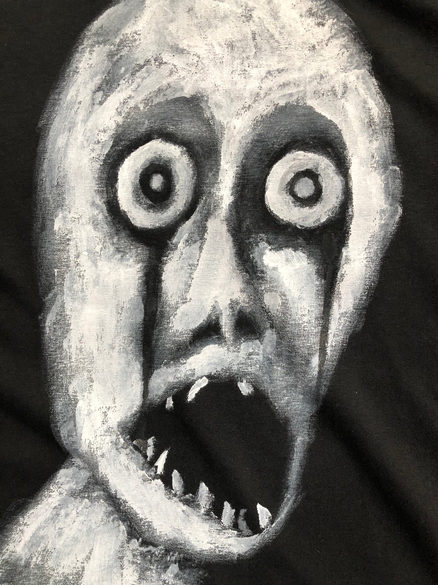 scary drawing on a men's t-shirt