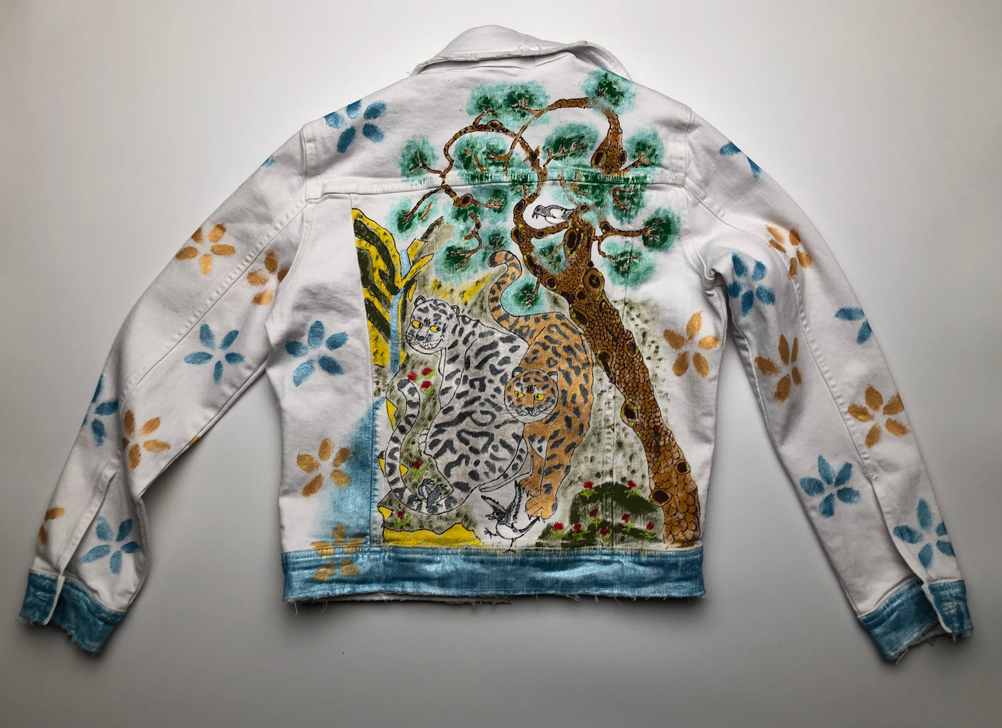 The back of women's denim jacket with cute Korean style tigers