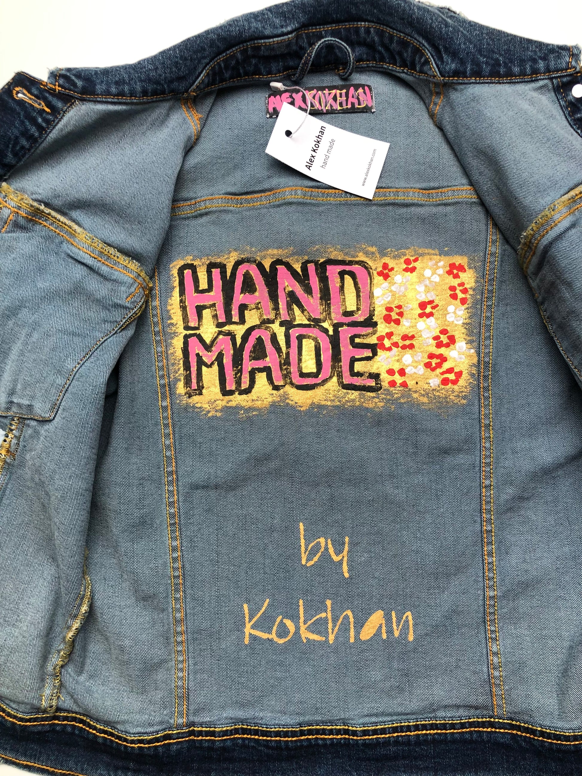 Painting on the inside of a women's denim jacket