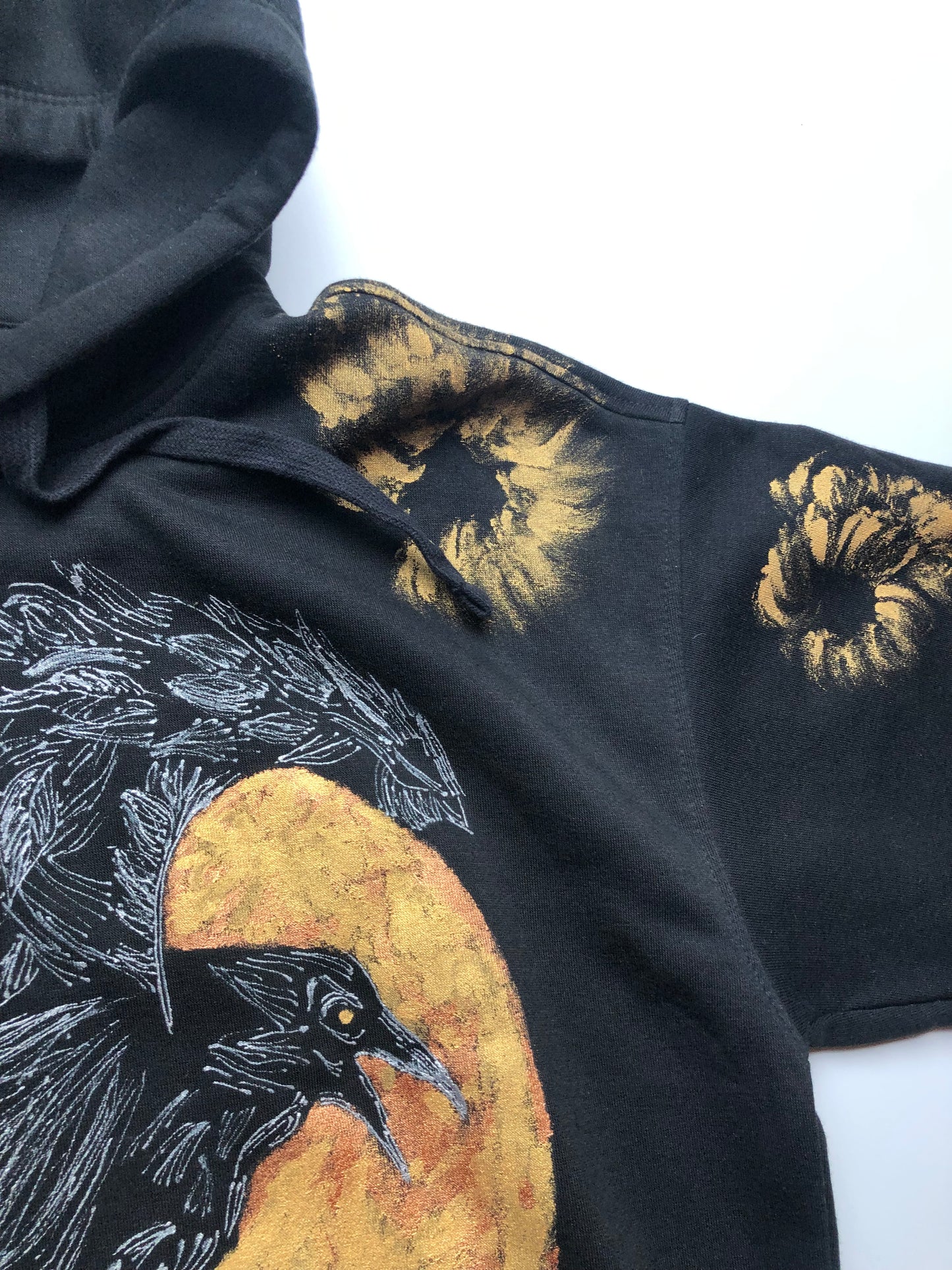 Women's hoodie black gold patterns on the sleeves details