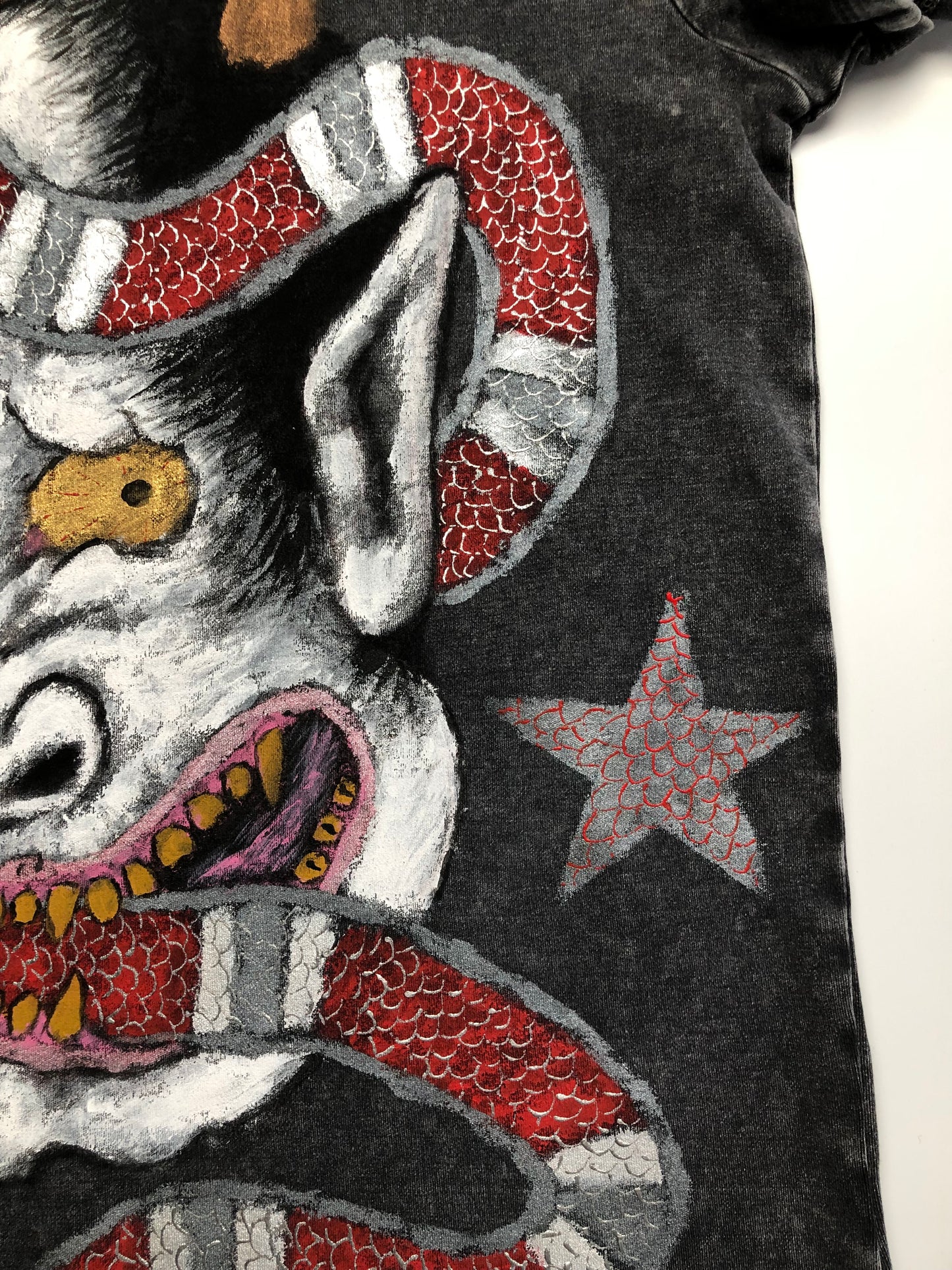 Women's T-shirt Japanese demon Oni with stars and a snake detail