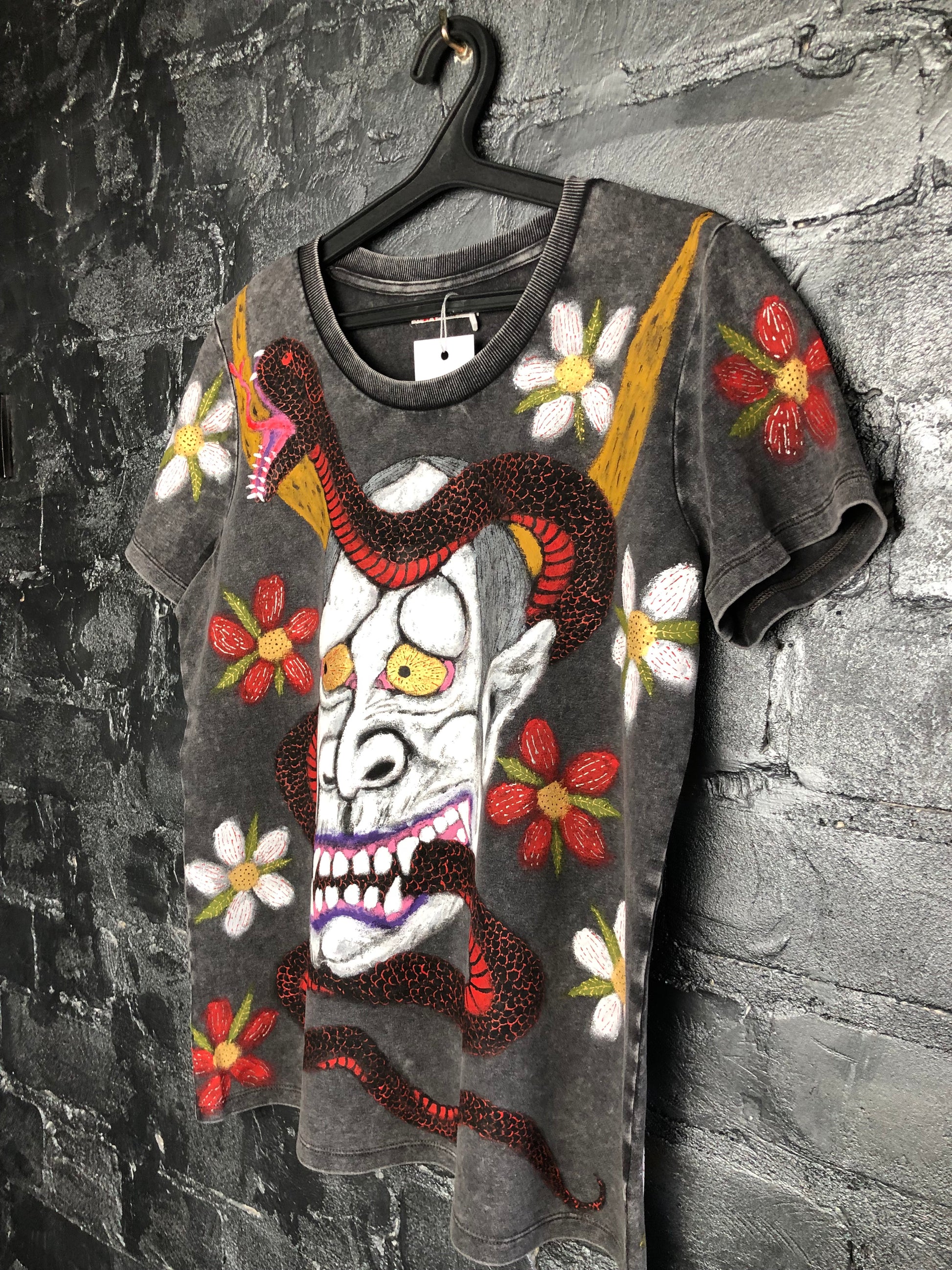 View on the side of Women's Hannya Demon T -shirt with A Snake and Floral Pattern