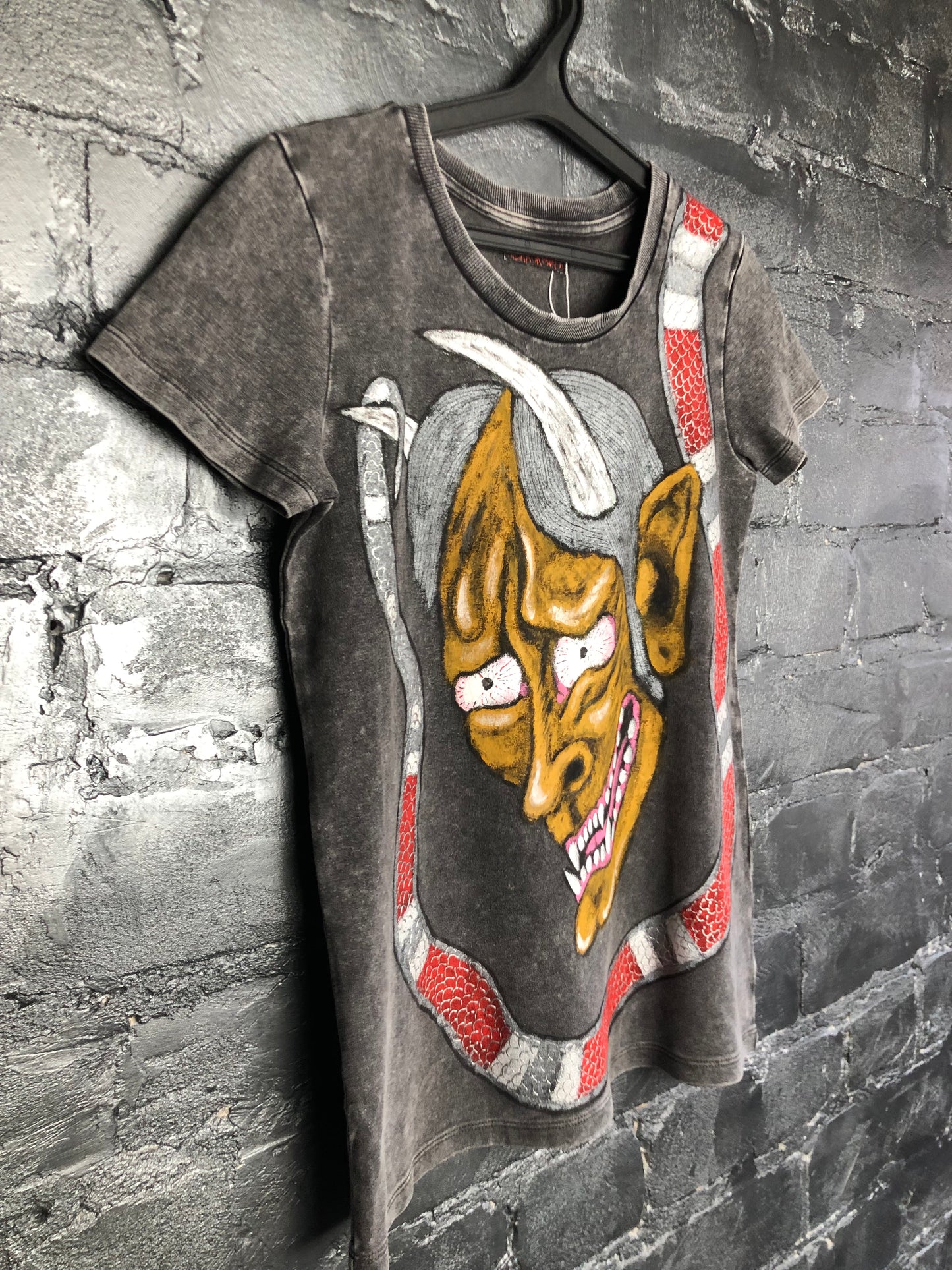 View on the side of Women's Hannya Demon Fancy Tattoo T -shirt with A Snake